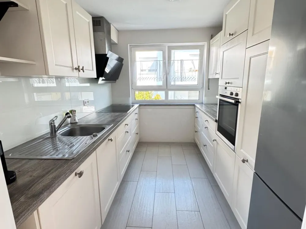 Helle 4-Zimmer Wohnung, Balkon und TG Stellplatz in ruhiger Lage