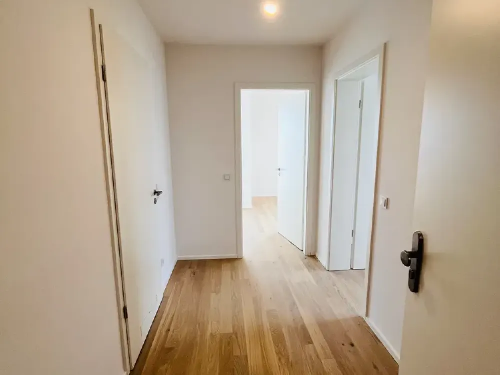 Neubau: Hochwertige 2-Zi.-Whg. mit Premium Küche, Südloggia & TG-Einzelstpl. in München-Feldmoching