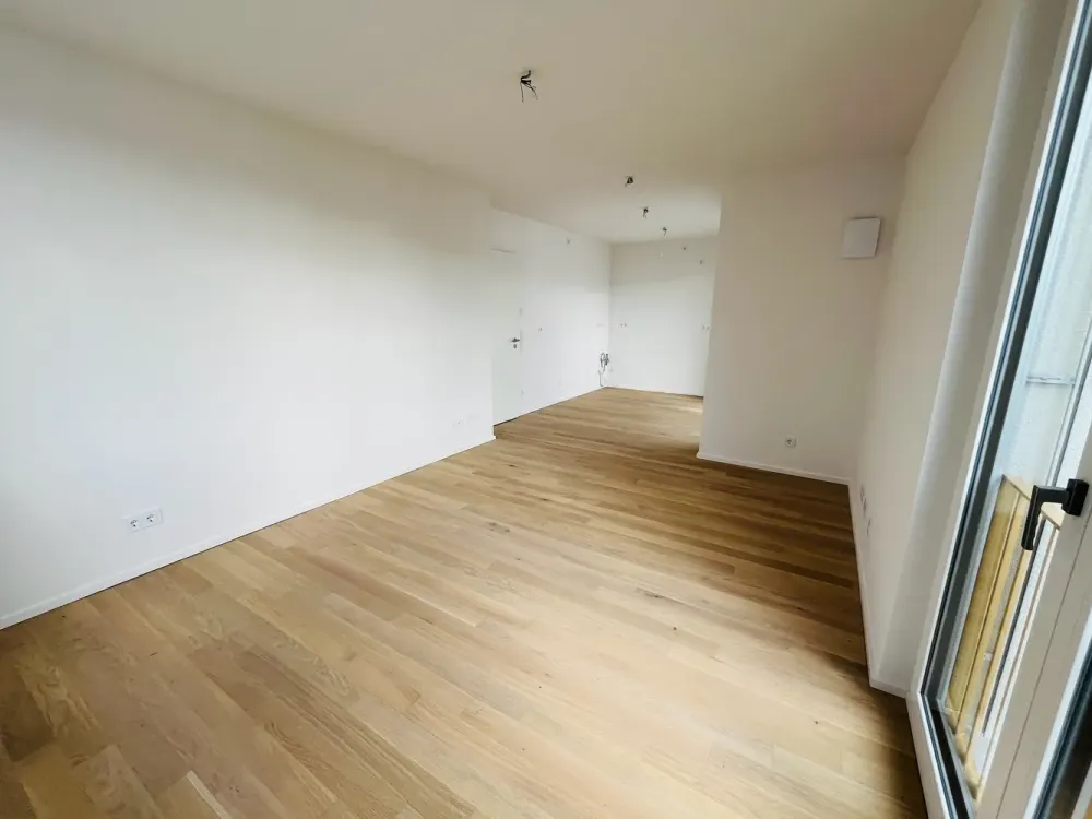 Neubau: Hochwertige 2-Zi.-Whg. mit Premium Küche, Südloggia & TG-Einzelstpl. in München-Feldmoching