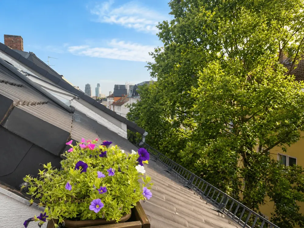 Quiet and modern 2-room apartment near the zoo with spacious roof terrace!