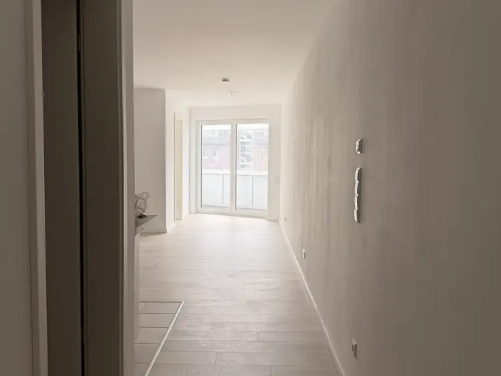 Moderne 2-Zimmer-Wohnung mit großem Balkon, Einbauküche & Fußbodenheizung, sofort bezugsfrei
