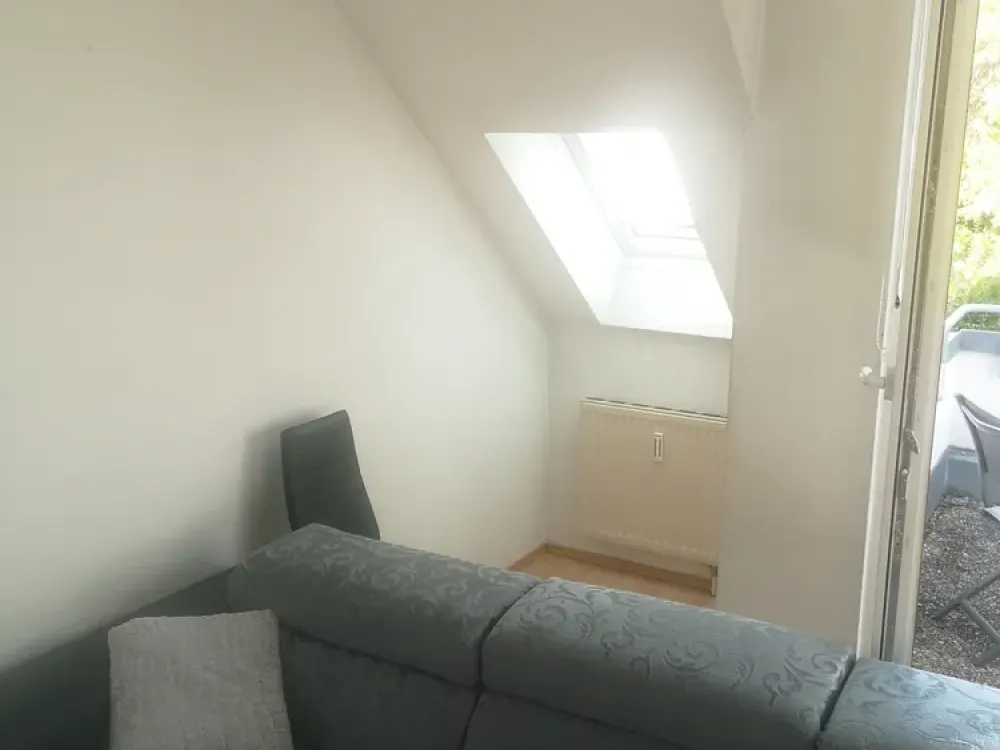 Zentral gelegene 2-Zimmer-Maisonettenwohnung mit Balkon und Tiefgaragenplatz in Stuttgart-Vaihingen