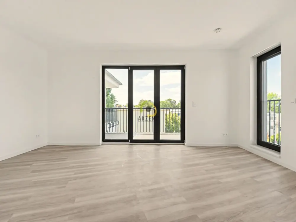 Erstbezug - Stilvolle 2-Zimmer-Neubauwohnung mit Balkon, EBK & Möblierung - Direkt am S-Bahnhof