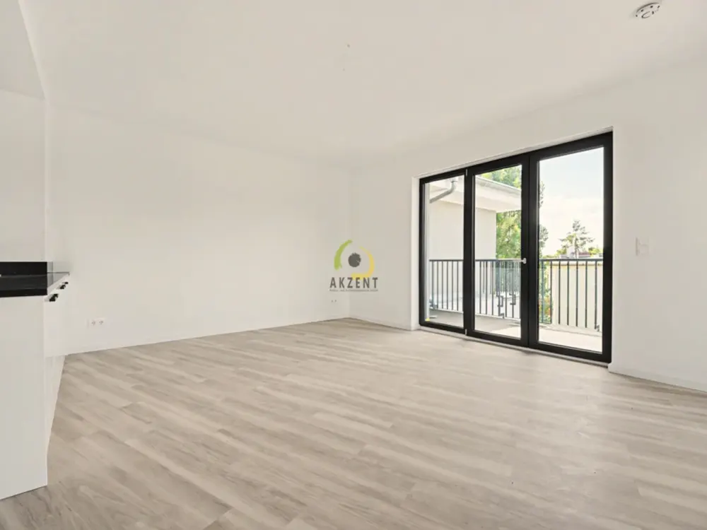 Erstbezug - Stilvolle 2-Zimmer-Neubauwohnung mit Balkon, EBK & Möblierung - Direkt am S-Bahnhof