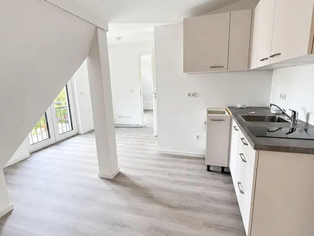 GANZ OBEN. GANZ GEMÜTLICH. 2 Zimmer mit Weitblick über die Gärten