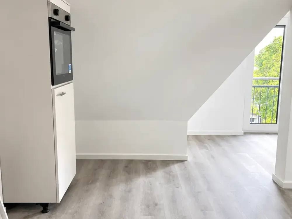 GANZ OBEN. GANZ GEMÜTLICH. 2 Zimmer mit Weitblick über die Gärten