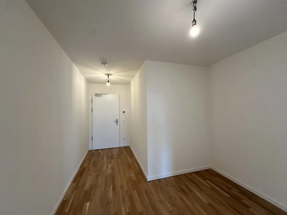 KfW 40-Neubau-Wohnung mit EBK, Südbalkon, Echtholzparkett, Fahrstuhl, Tiefgarage