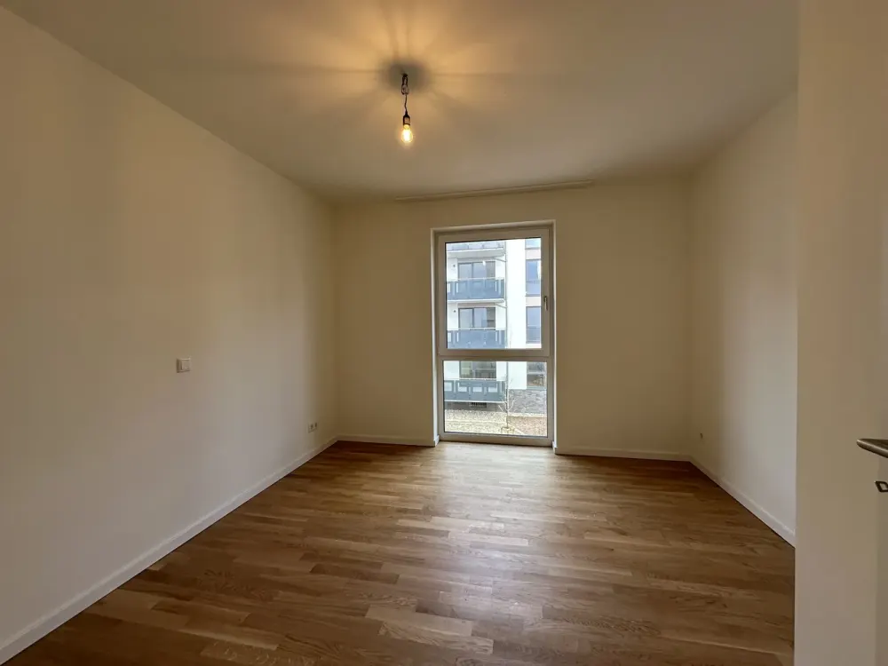 KfW 40-Neubau-Wohnung mit EBK, Südbalkon, Echtholzparkett, Fahrstuhl, Tiefgarage