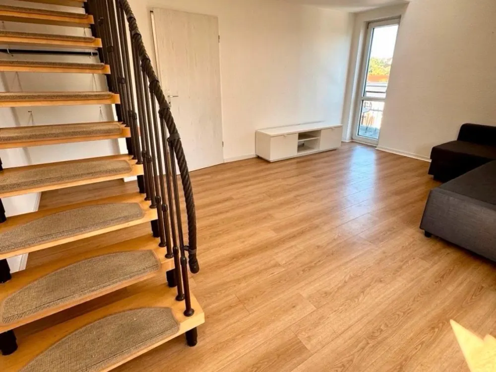 Lichtdurchflutete 1,5 ZKB Maisonettenwohnung in zentraler Lage