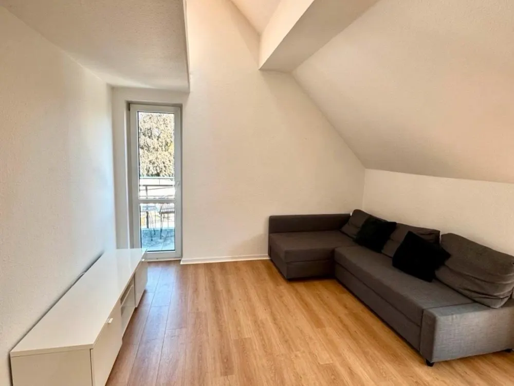 Lichtdurchflutete 1,5 ZKB Maisonettenwohnung in zentraler Lage