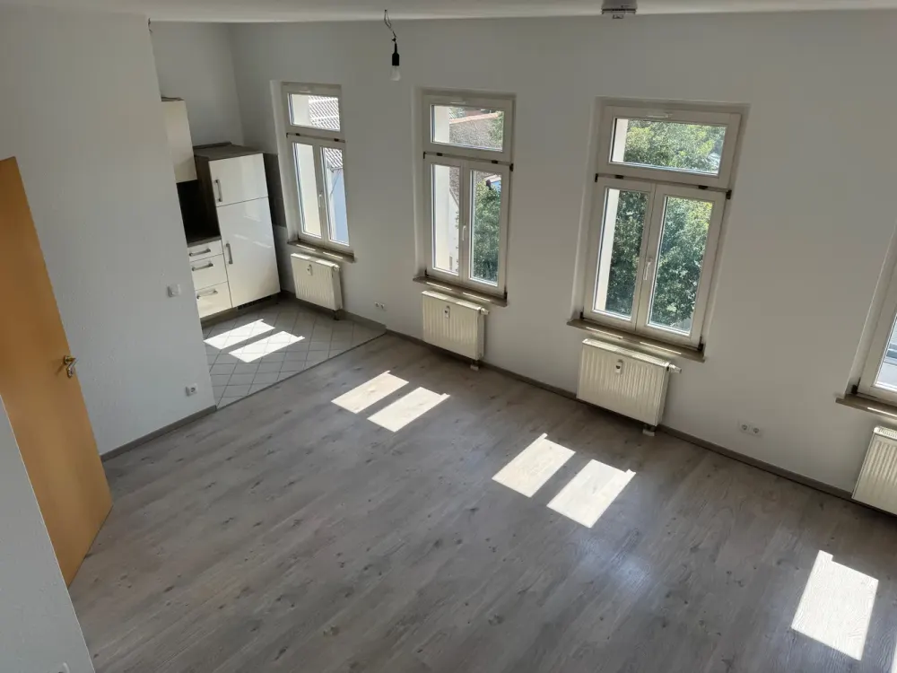 Charming 2-Room Attic Maisonette with Two Bathrooms, New Staircase, Parking Space and Aue