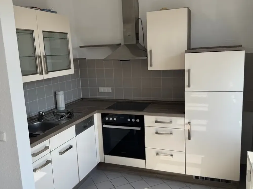 Charming 2-Room Attic Maisonette with Two Bathrooms, New Staircase, Parking Space and Aue