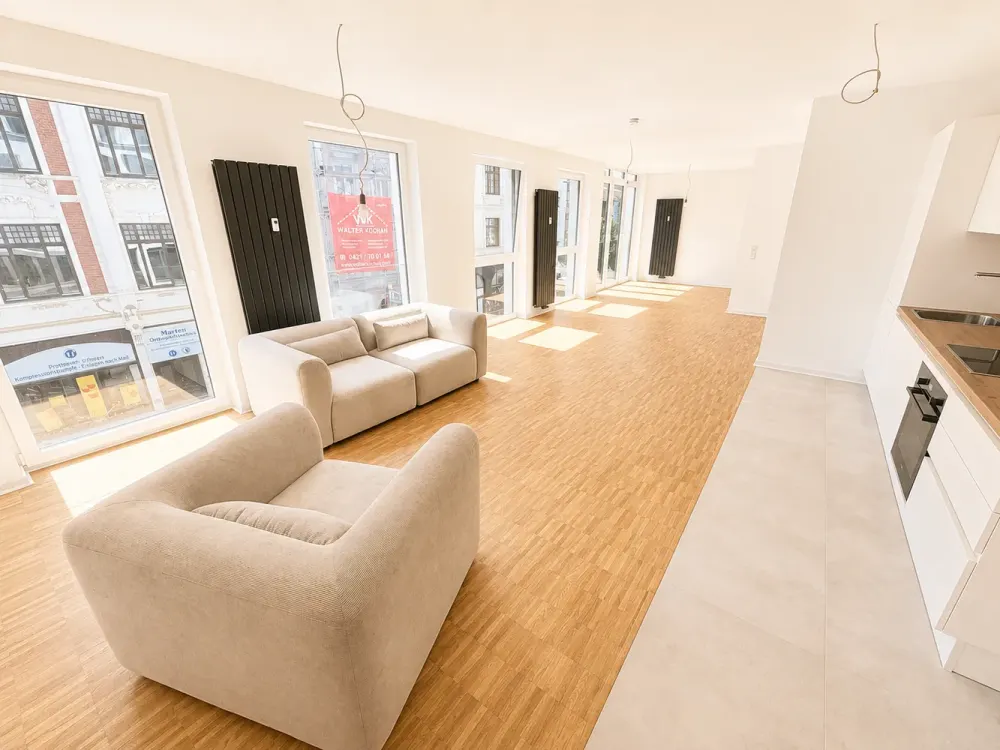 Erstbezug auf ca. 65 m²: Lichtdurchflutetes Appartment mit EBK, Schrank, Bett & Sofa
