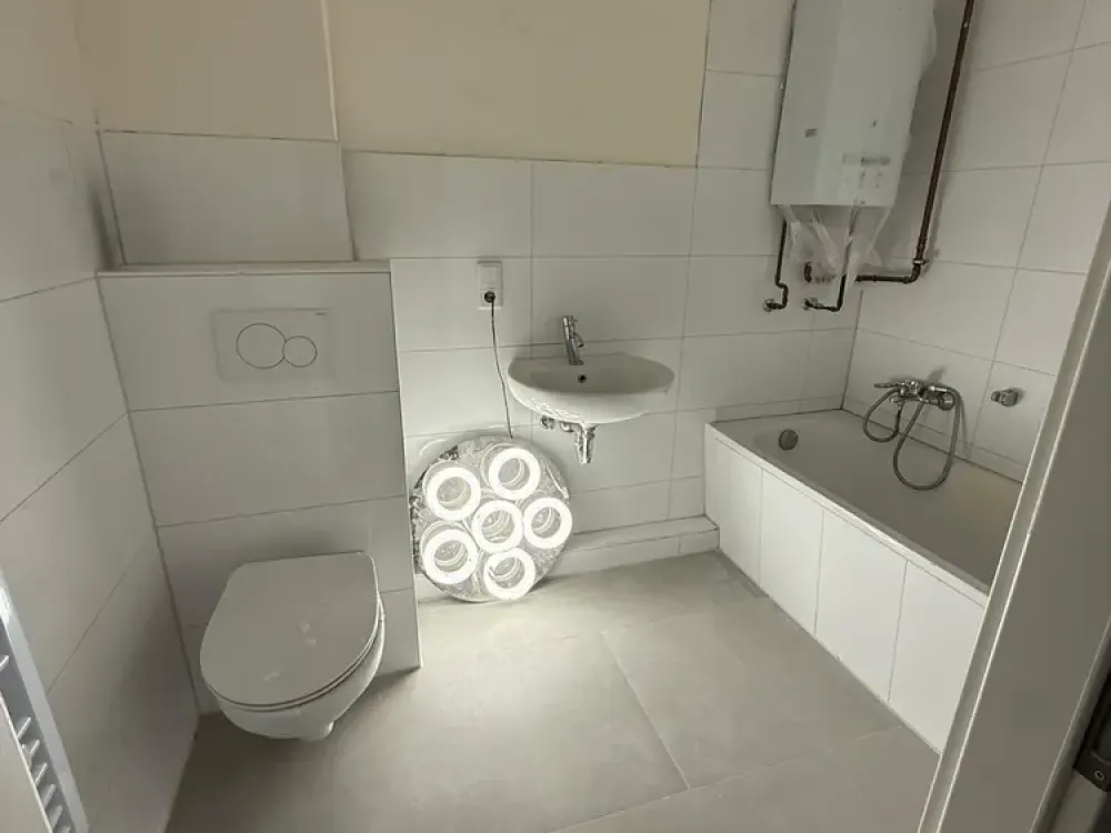 Modernized 2-Room Apartment with Balcony & Built-in Kitchen in Neustadt