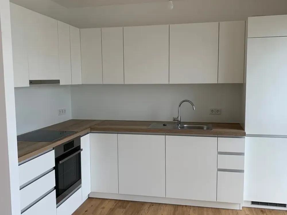 4-Room Apartment with Balcony and Built-in Kitchen