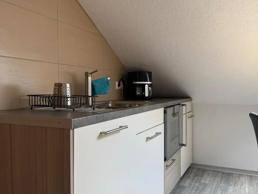 Eine 2 Zimmer Dachgeschosswohnung mit seperater Küche