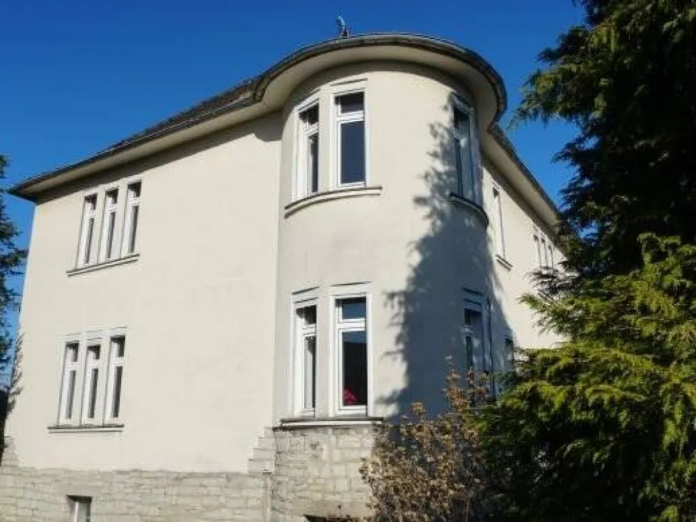 3-4 Zimmerwohnung in Stadtvilla mit Balkon und großem Garten