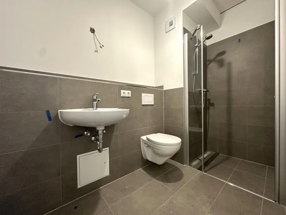 Neubau! Stilvolle 2-Zimmer-Penthousewohnung mit Terrasse & Einbauküche im Zentrum-Ost
