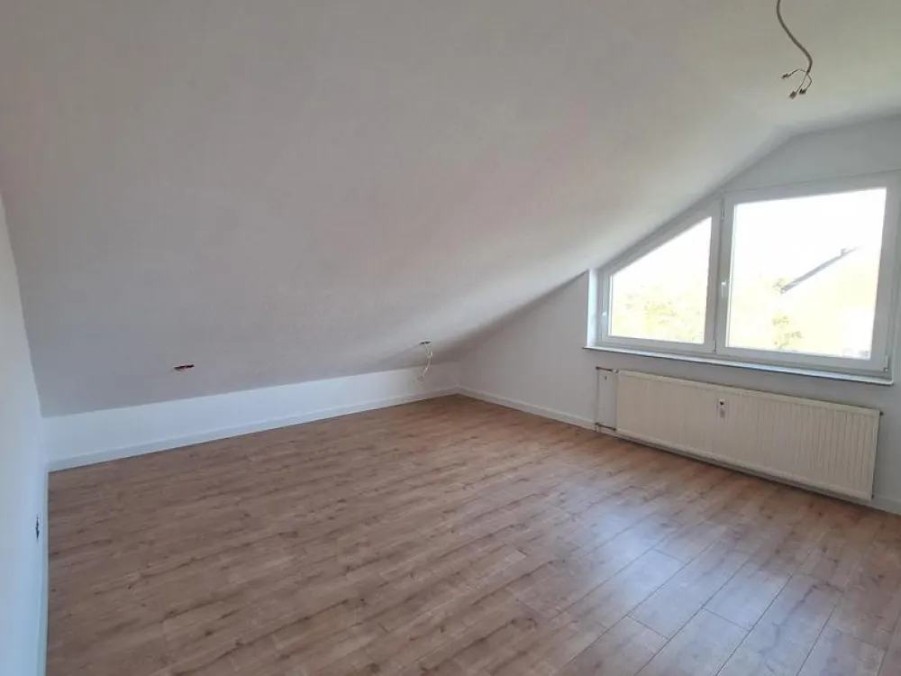 First Occupancy After Renovation - 3-Room Attic Apartment with Large Balcony in Altgarbsen