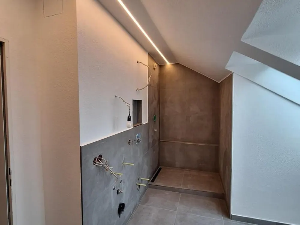 First Occupancy After Renovation - 3-Room Attic Apartment with Large Balcony in Altgarbsen