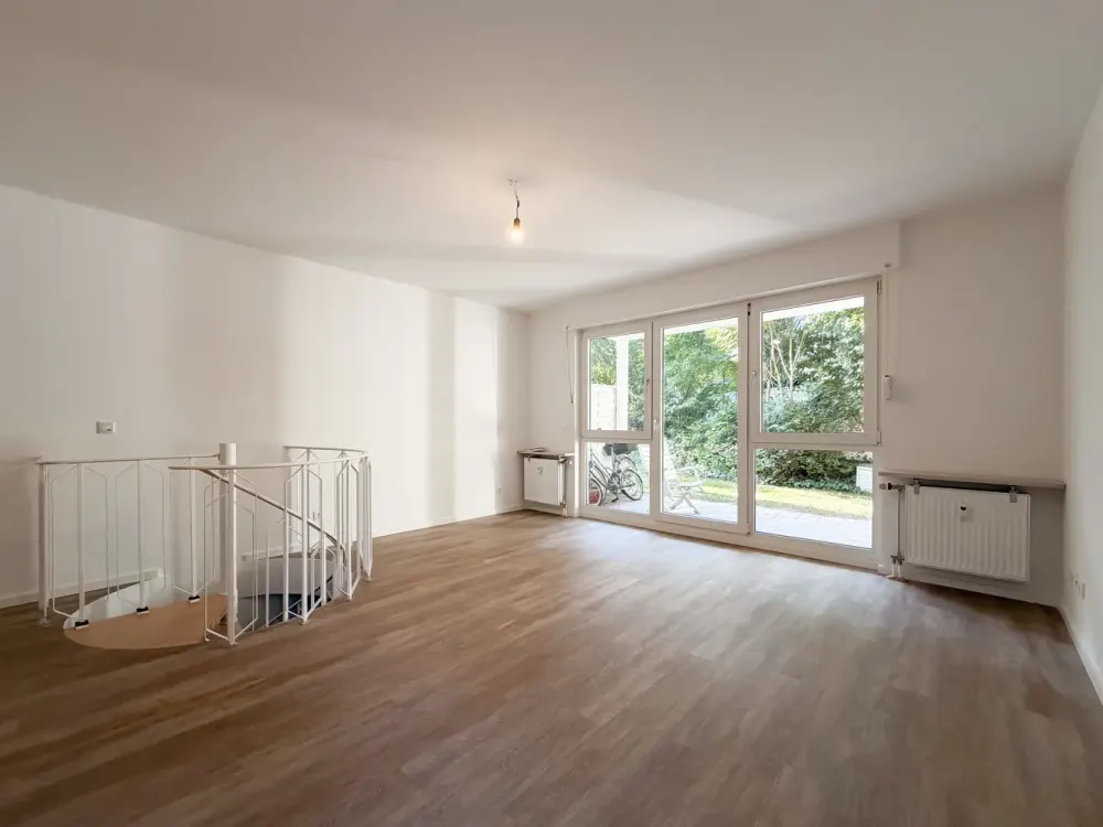 Wohnen auf zwei Ebenen, frisch sanierte 3-Zimmer-Wohnung mit Terrasse & Gartenzugang in Frohnau