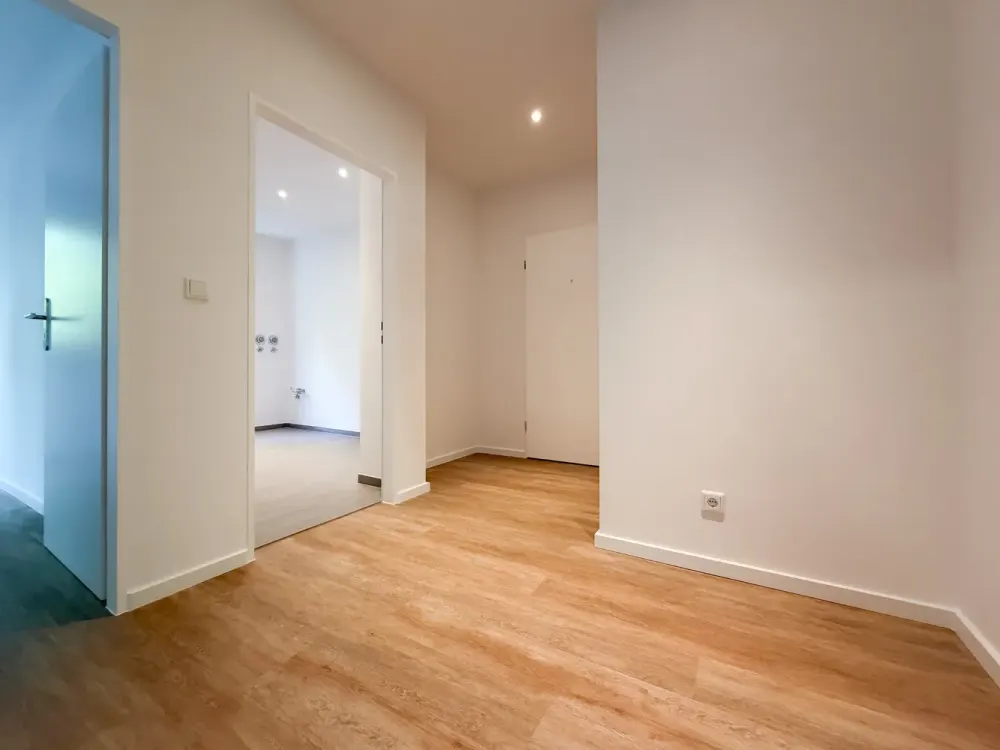 Wohnen auf zwei Ebenen, frisch sanierte 3-Zimmer-Wohnung mit Terrasse & Gartenzugang in Frohnau