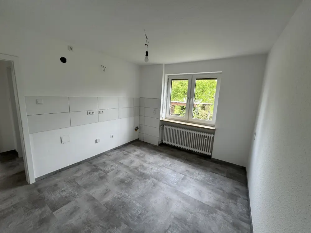 Sanierte 3-Zimmer-Wohnung mit Balkon, Garage und Gartenmitbenutzung in Heiligenrode