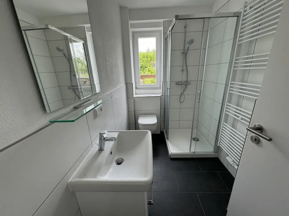 Sanierte 3-Zimmer-Wohnung mit Balkon, Garage und Gartenmitbenutzung in Heiligenrode
