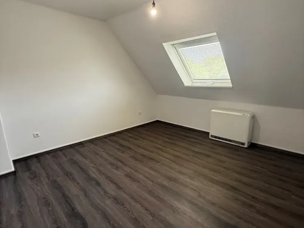 Gemütliche Dachgeschoss-Wohnung mit besonderem Charme