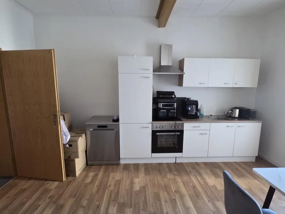 2-Zimmer-Erdgeschosswohnung mit Wintergarten & Garten