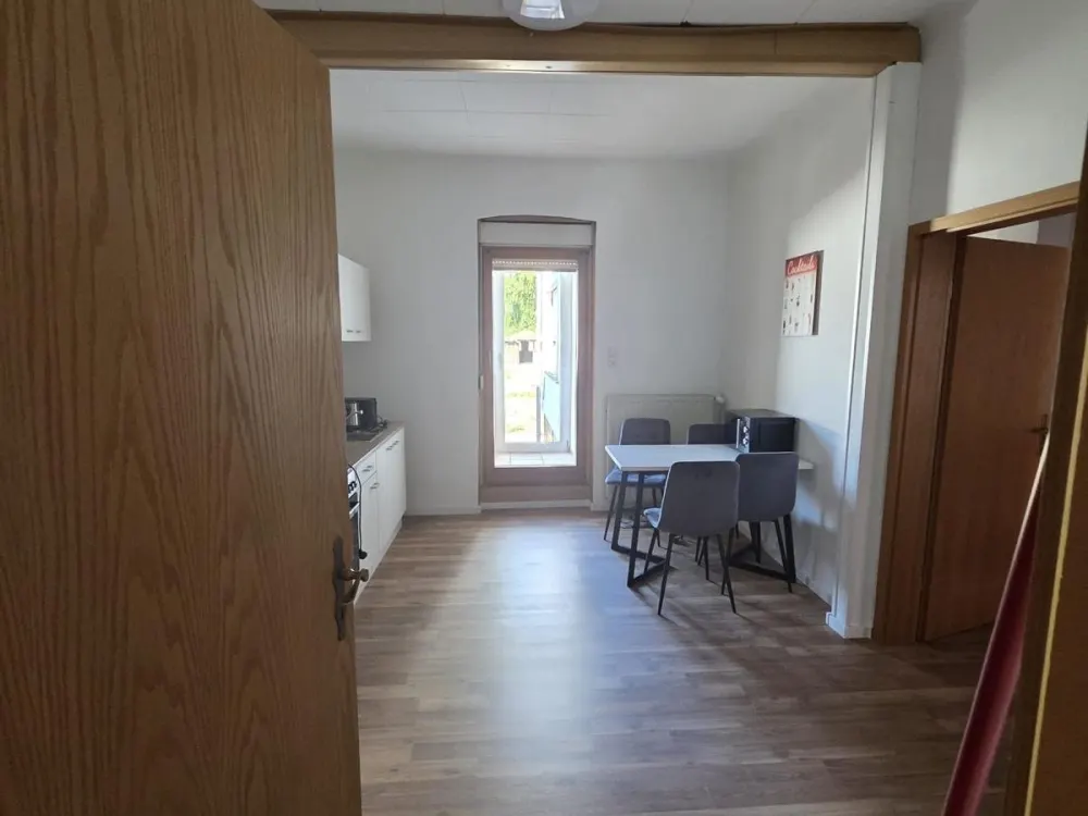 2-Zimmer-Erdgeschosswohnung mit Wintergarten & Garten