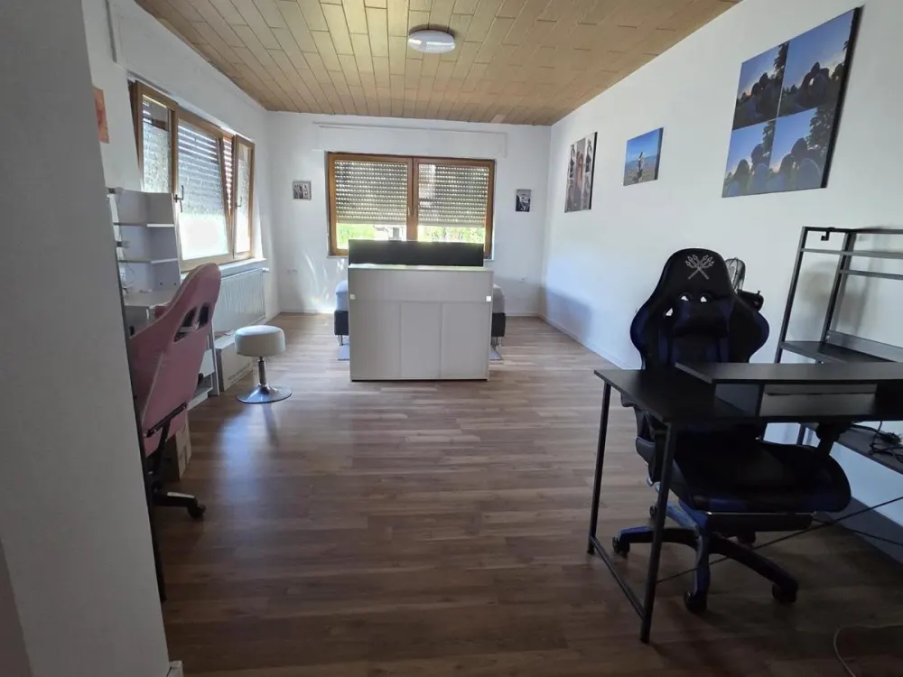 2-Zimmer-Erdgeschosswohnung mit Wintergarten & Garten