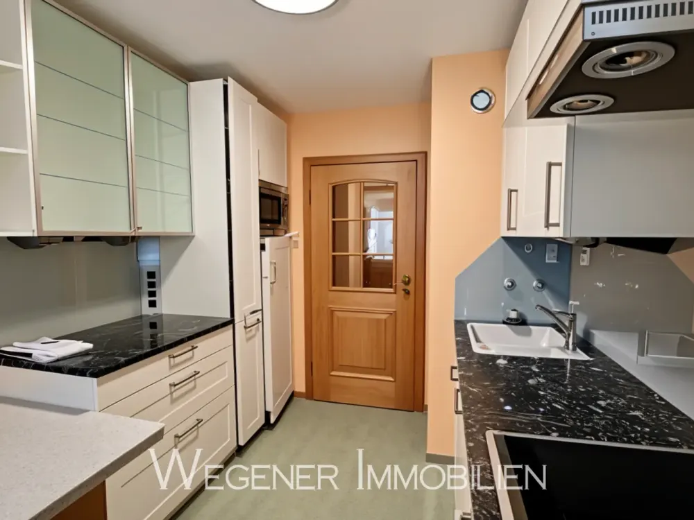 Bright, well-maintained 2-room apartment, SW loggia, fitted kitchen + lockable underground parking space in attractive location Haar!