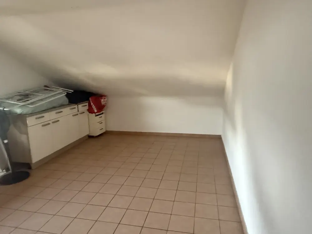 Living with Character: Attic Apartment in Muggensturm