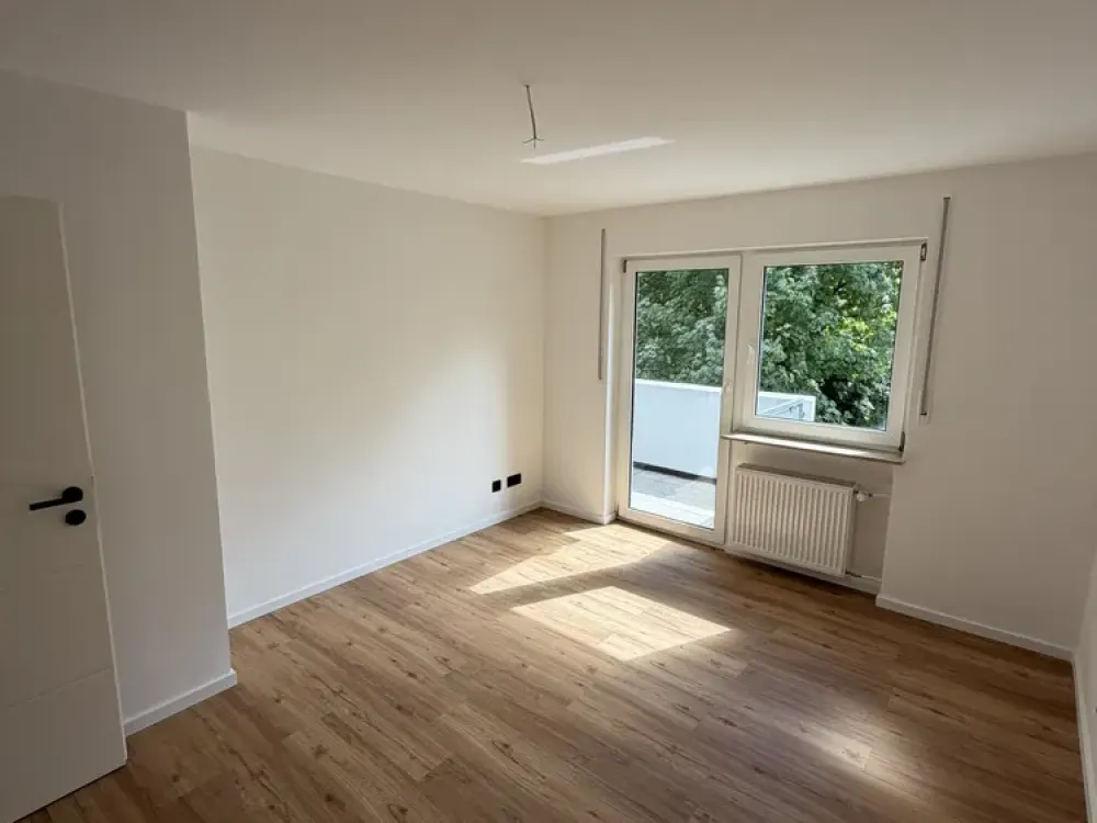 First Occupancy After Complete Renovation - 2-Room Apartment with Balcony and Fitted Kitchen