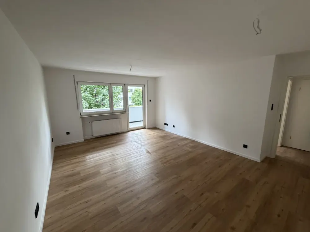 First Occupancy After Complete Renovation - 2-Room Apartment with Balcony and Fitted Kitchen