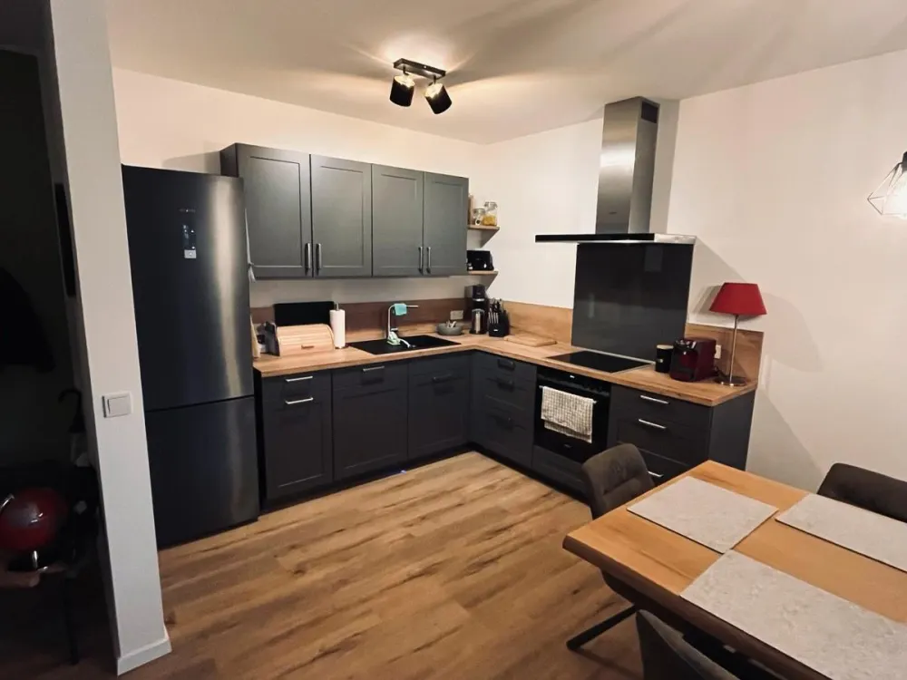 Moderne 2-Zimmer Erdgeschosswohnung mit eigenem Garten & TG-Platz