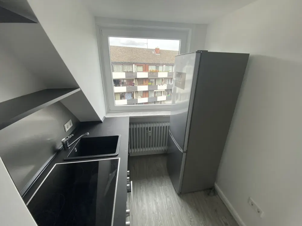 Traumhafte Dachgeschosswohnung mit Südbalkon, ruhig & zentral