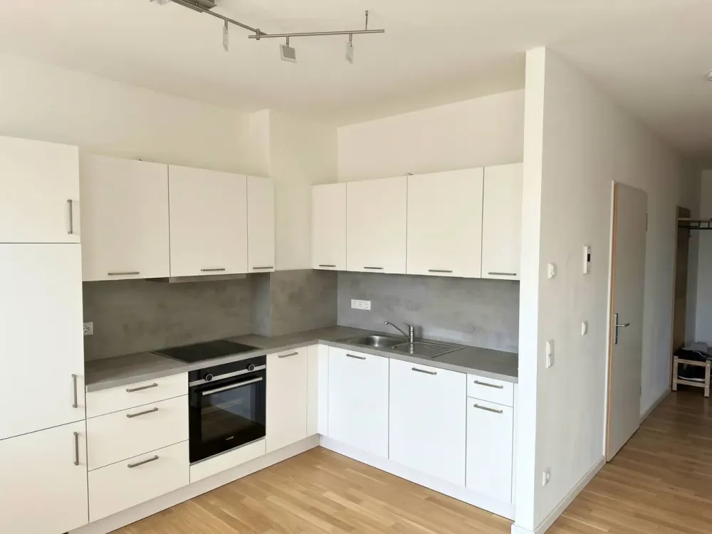** Hochwertige 3-Zi.-Erdgeschosswohnung mit EBK, 2 Tageslichtbädern, Terrasse und Gartenanteil **