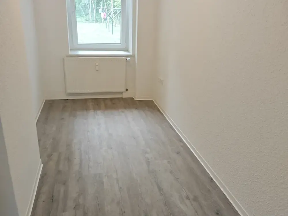 Erstbezug nach Sanierung, schicke 1,5 Raum Wohnung mit Gartenanteil und Tageslichtbad