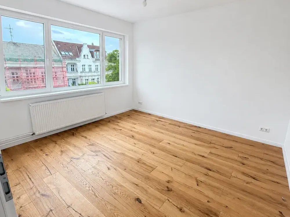 Erstbezug | Lichtdurchflutete Wohnung mit Balkon und Einbauküche