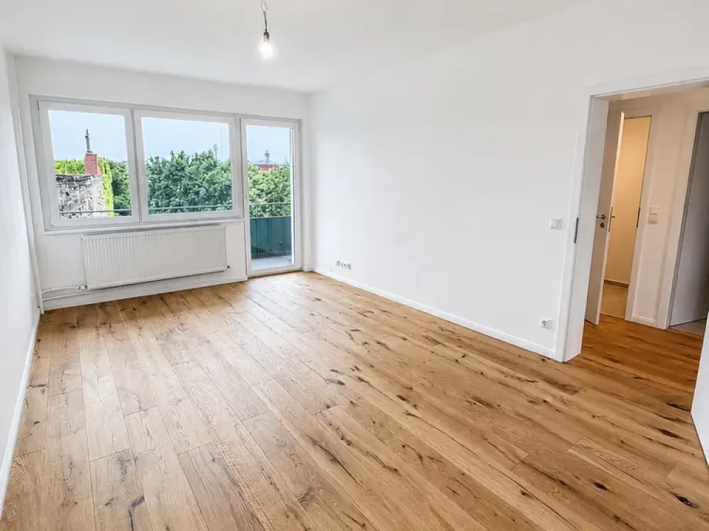 Erstbezug | Lichtdurchflutete Wohnung mit Balkon und Einbauküche