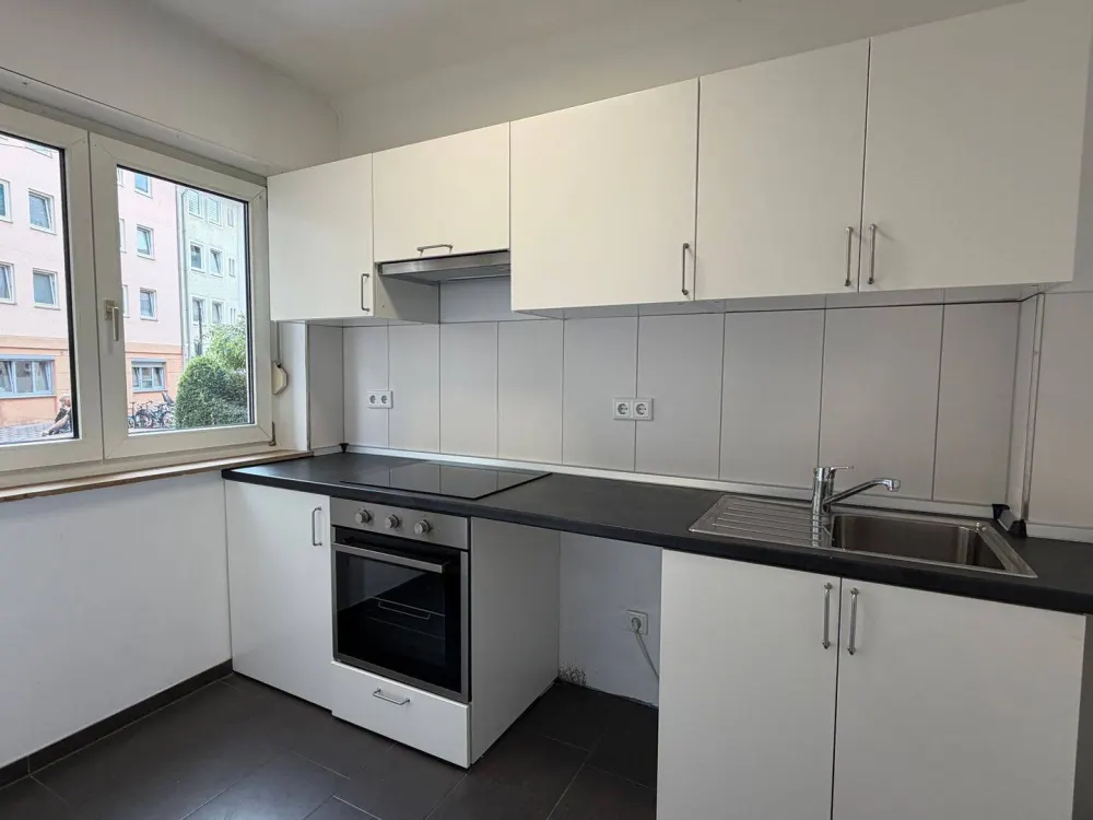 sanierte 1-Zimmer-Wohnung mit Balkon und Einbauküche in zentraler Lage