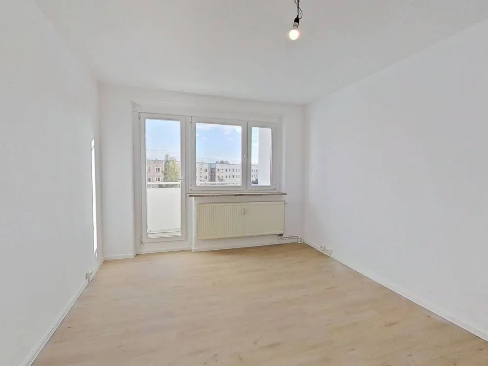 Moderne 3-Zimmer-Wohnung mit Balkon über den Dächern von Rostock