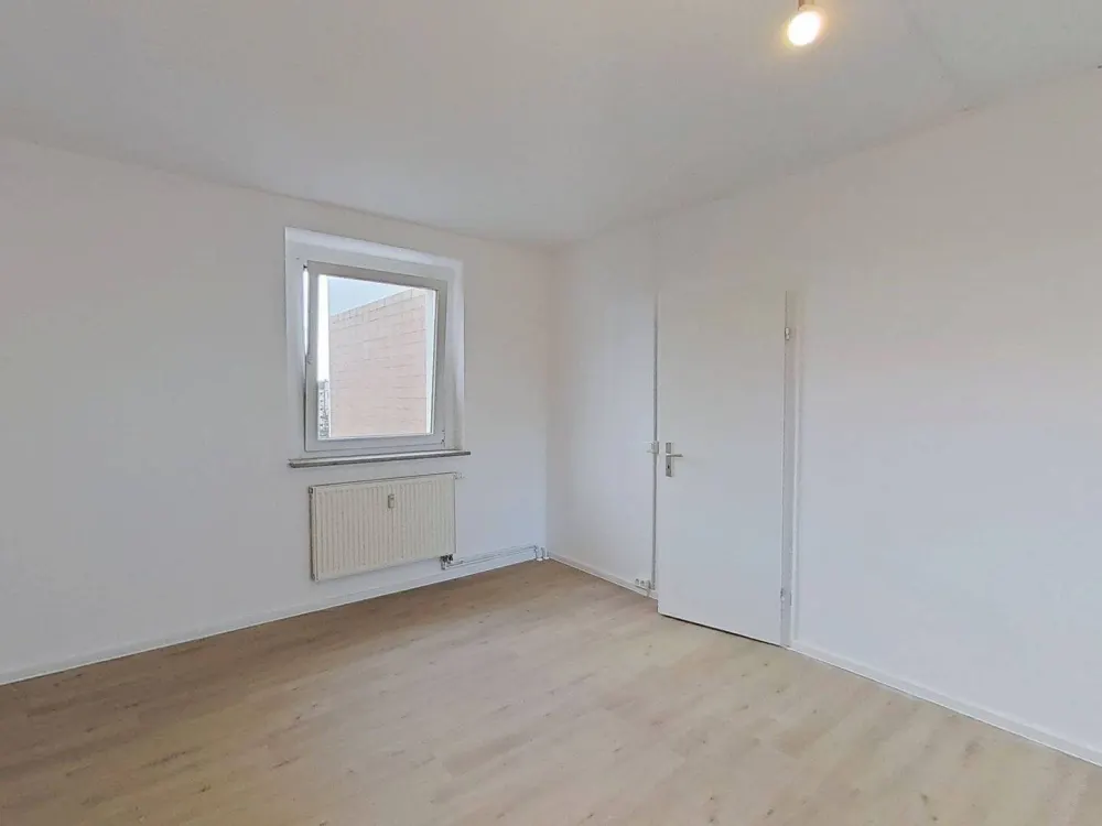 Moderne 3-Zimmer-Wohnung mit Balkon über den Dächern von Rostock