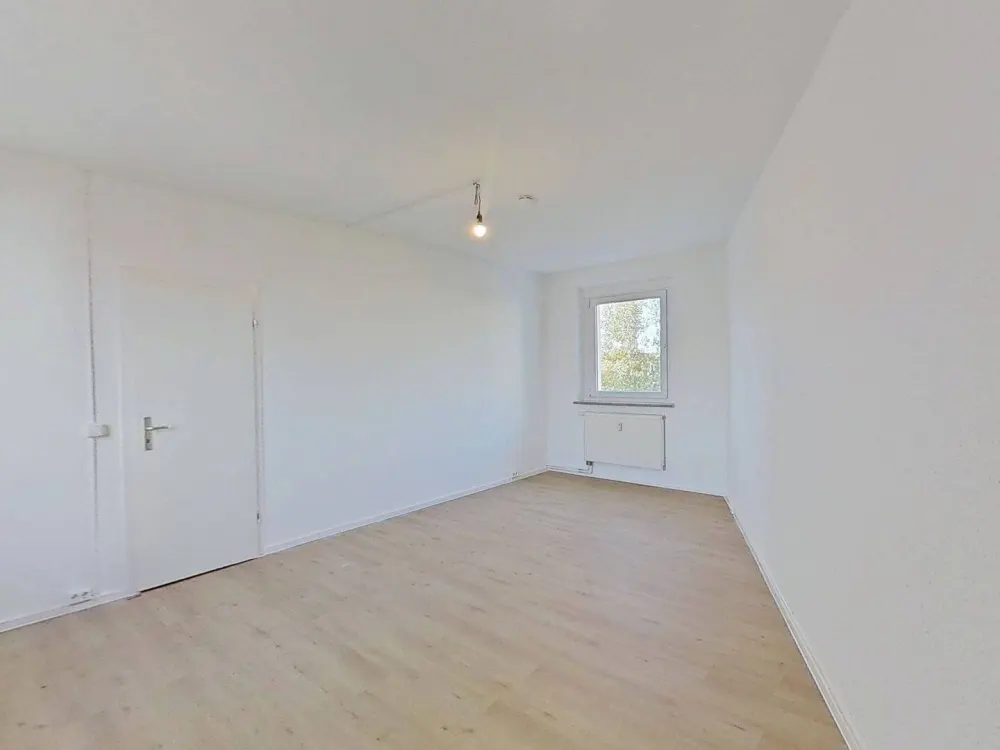 Moderne 3-Zimmer-Wohnung mit Balkon über den Dächern von Rostock