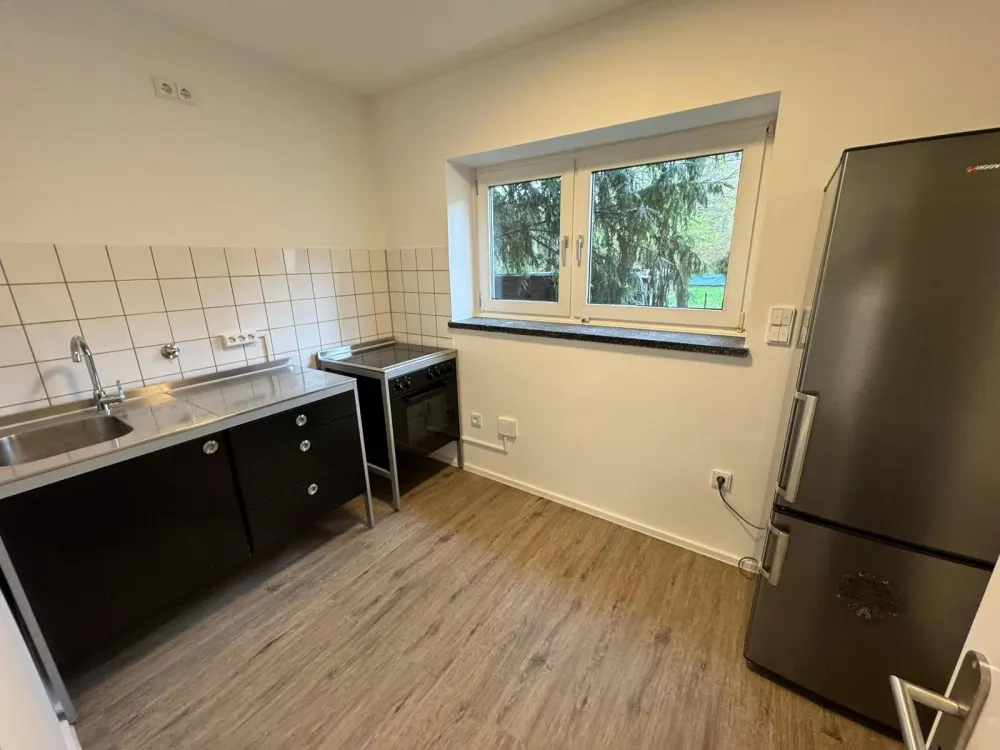 Frisch kernsanierte, charmante möbilierte 1 Zimmerwohnung im EG