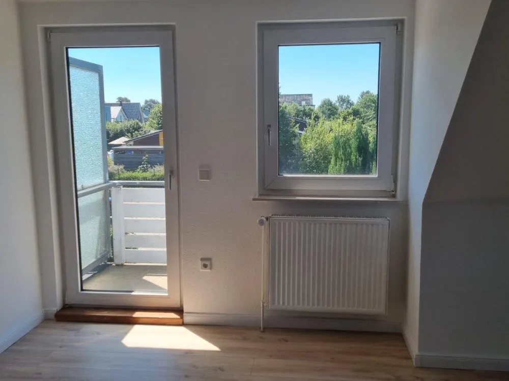 Freundliche Dachgeschosswohnung im Maisonettestil in Klecken