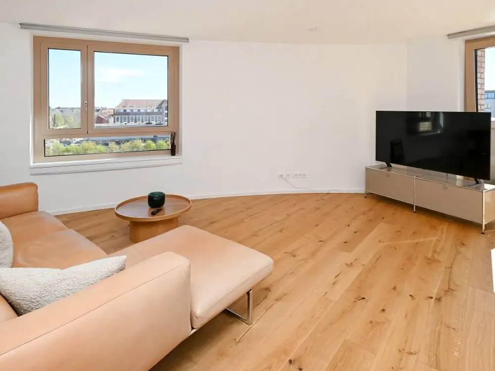 Exklusives Wohnen mit außergwöhnlicher Architektur und perfektem Grundriss!