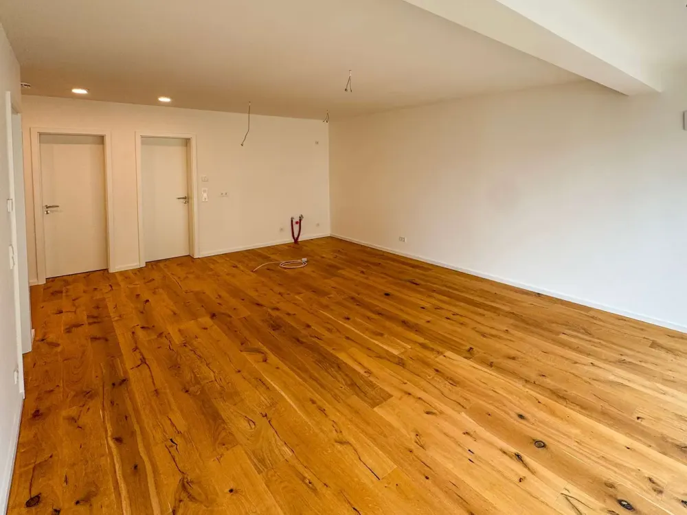 2-Zimmer-Wohnung in begehrter Adresse l Neubau l Tiefgarage l Aufzug